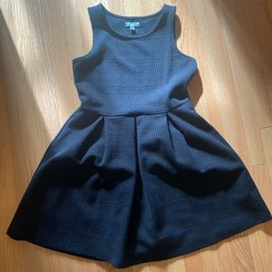 Black dress with pleated skirt. Size 10